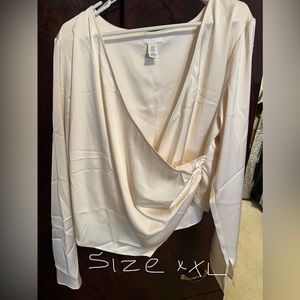 Soft ivory colored women’s plus blouse